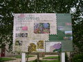 vignette  Lanarvily : panneau avant nettoyage, site 'Terre d'Hortensias' au boug